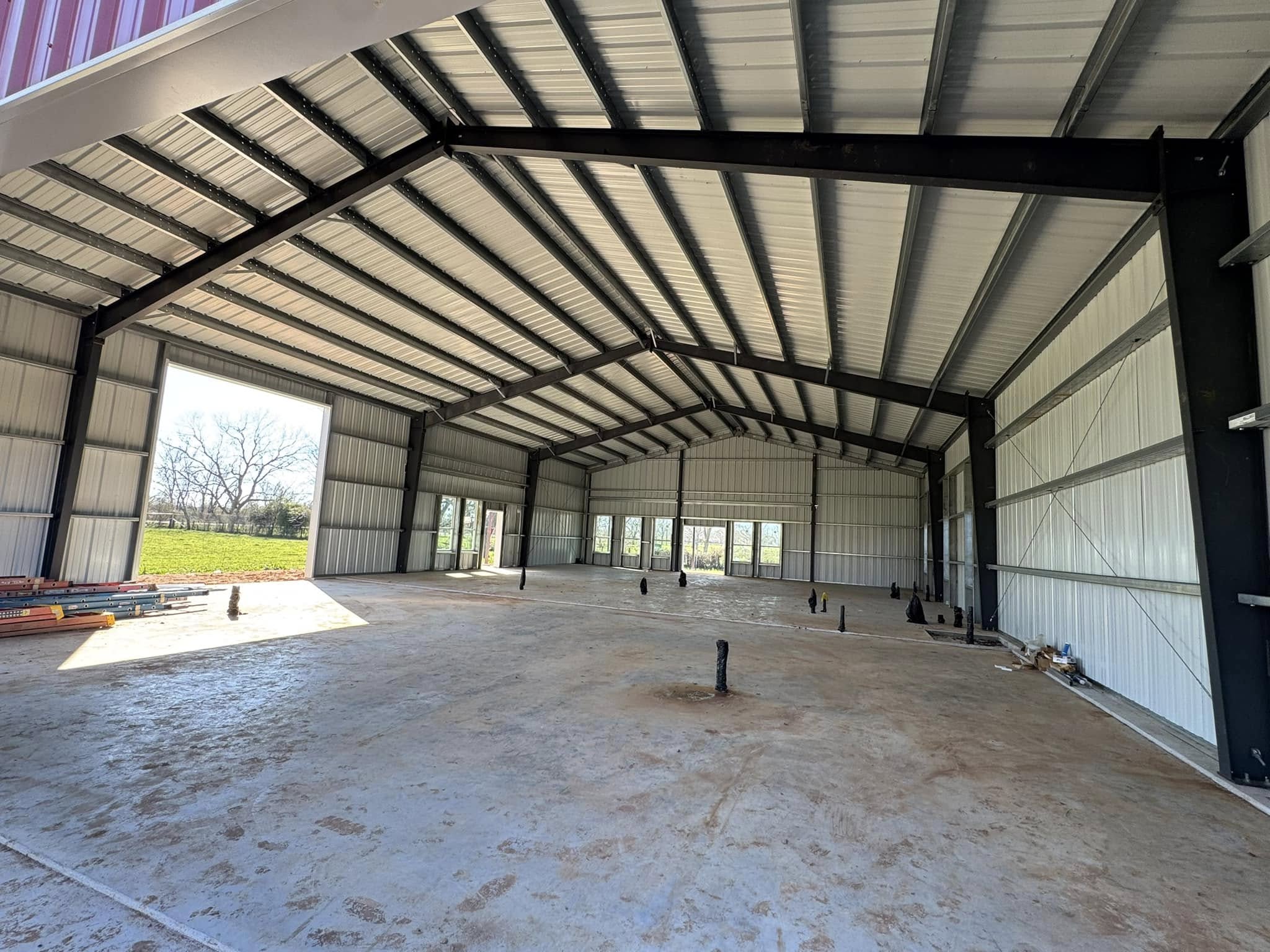 Interior of large metal workshop building constructed by Hawkeye Construction LLC