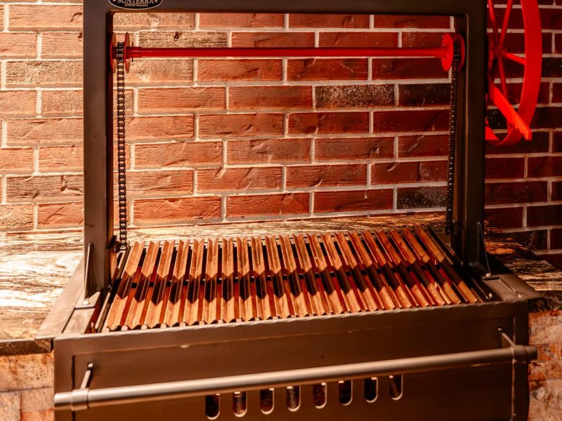 Santa Maria grill built into the outdoor kitchen